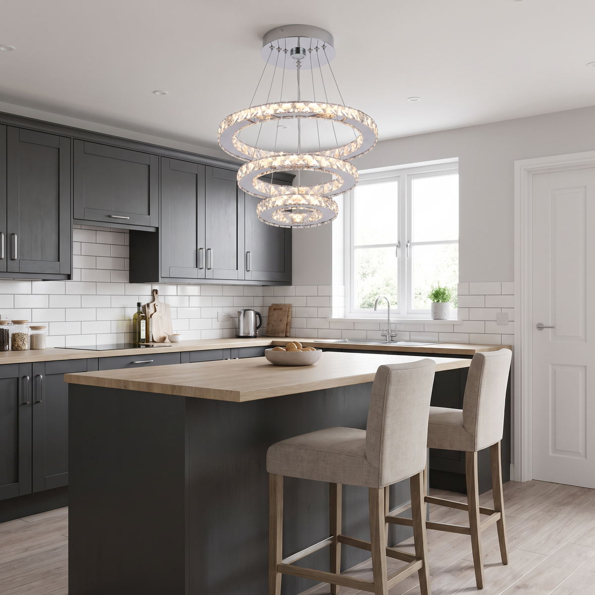 Clarence crystal ring pendant light in chrome above a kitchen island