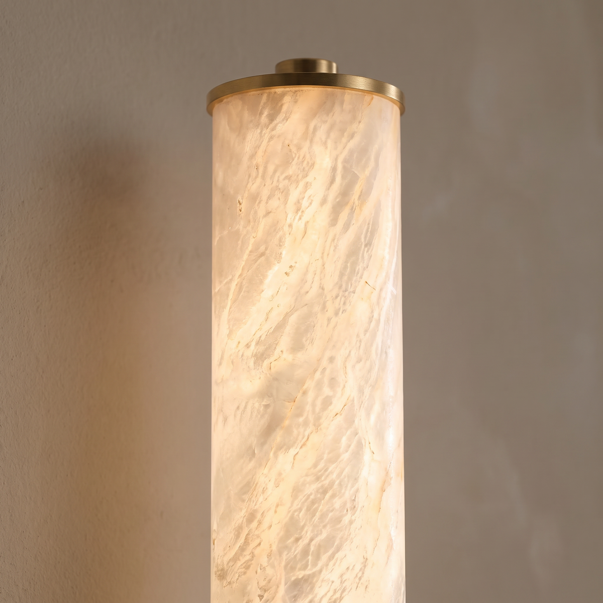 Belsize alabaster wall light, close-up of the alabaster column and gold end cap