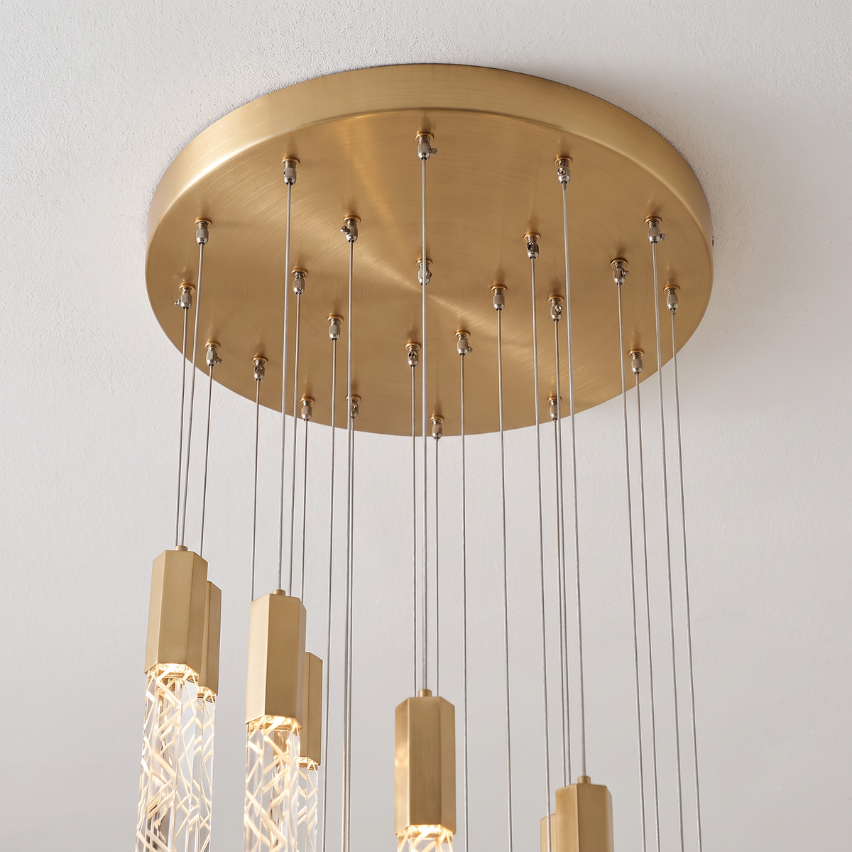 Somerset spiral crystal chandelier, close-up of the gold ceiling canopy