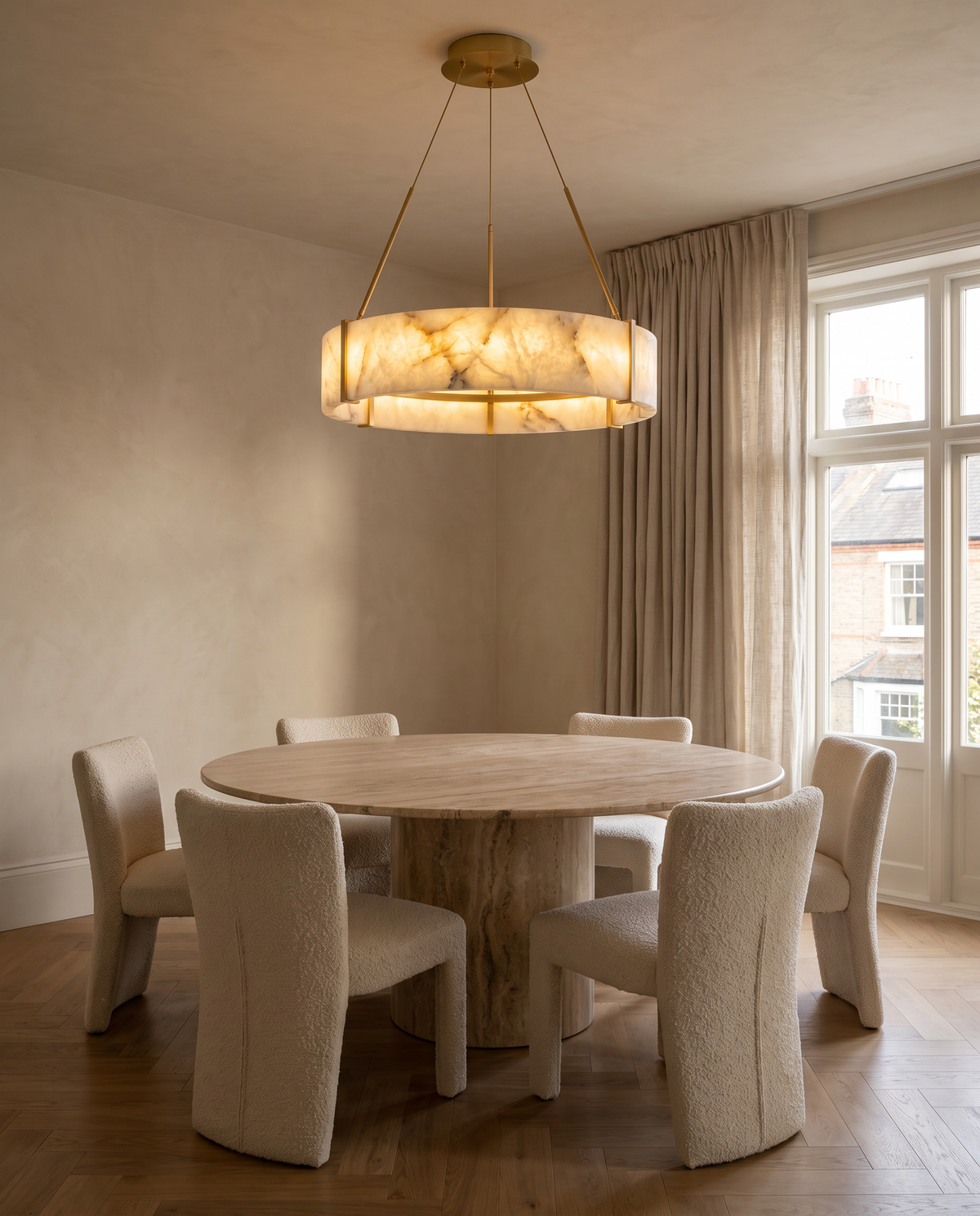 Highgate alabaster ring chandelier above a dining table