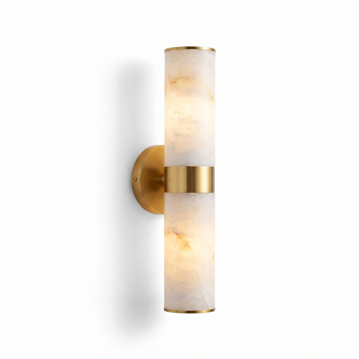 Holland up and down wall light in alabaster with gold ring on a white background