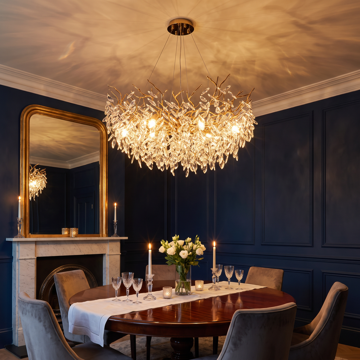 Kew crystal leaf chandelier lit above a candlelit dining table in a navy Georgian dining room