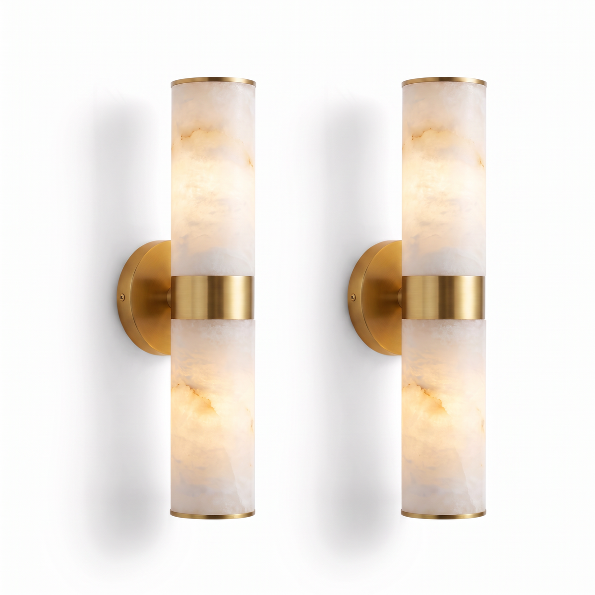 Holland up and down wall light, a pair in alabaster with gold rings on a white background