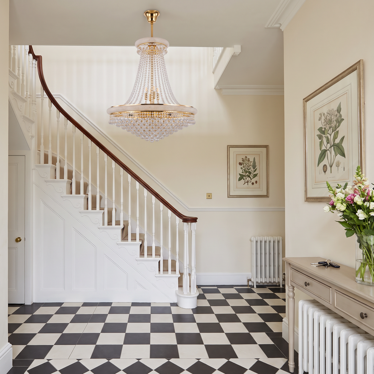 Belgravia empire crystal chandelier in gold in a Georgian entrance hall with staircase