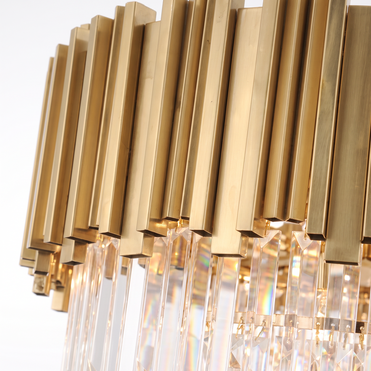 Kensington round crystal chandelier, close-up of the fluted gold band and crystal prisms