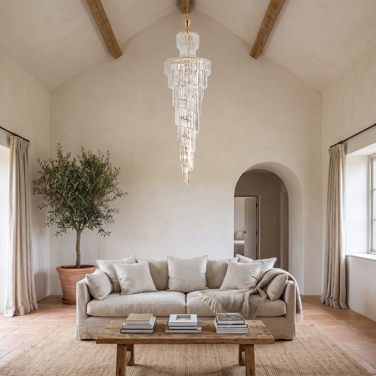 Knightsbridge spiral staircase chandelier in a high-ceiling Mediterranean-style living room