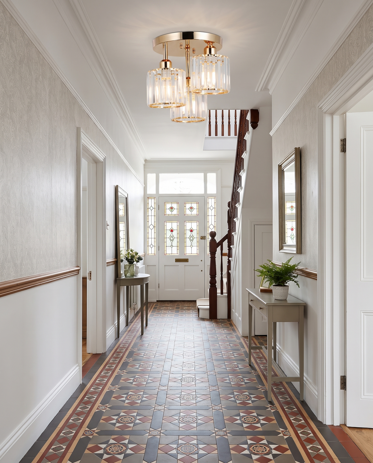 Strand crystal semi flush ceiling light in a Victorian entrance hall with patterned tiles